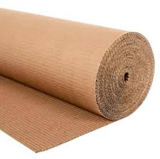 A large roll of corrugated fluting paper showing the textured medium used for box strength.