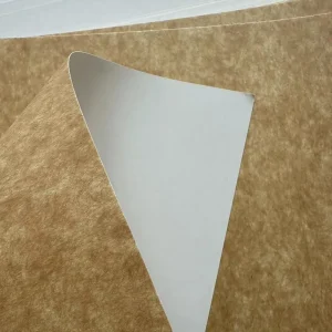 A sheet of kraft board with a white coated front and a natural brown kraft reverse.