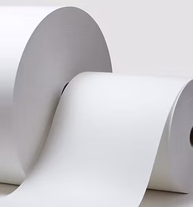 Roll of Oji Papers showing a variety of weights and high-whiteness finishes.