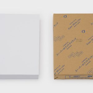 Samples of Oji Papers showing a variety of weights and high-whiteness finishes.