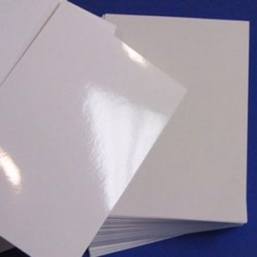 A stack of PE Gloss Offset synthetic paper with a high-shine finish.