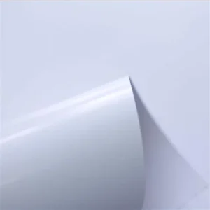 Premium Magno Plus Gloss coated art paper showing high-reflectivity surface.